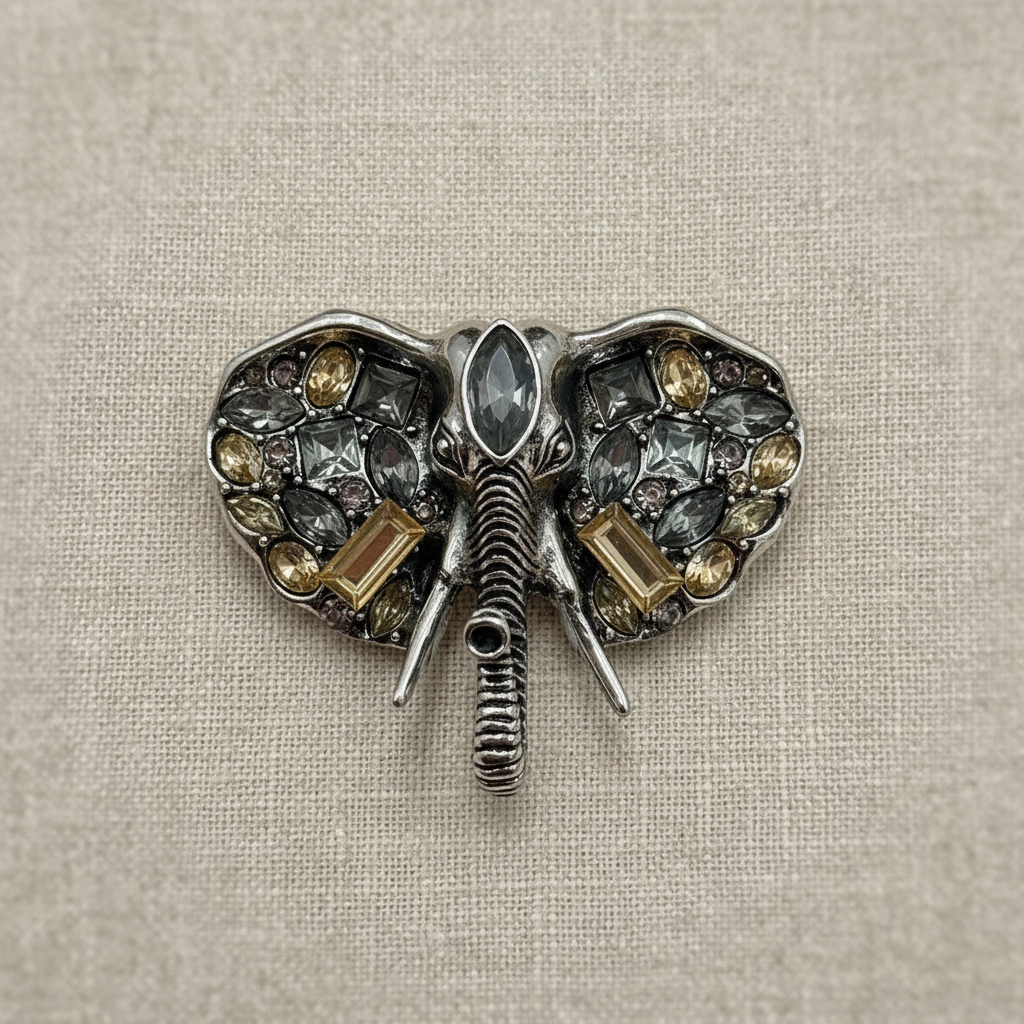 Broche elefante sobre tecido elegante