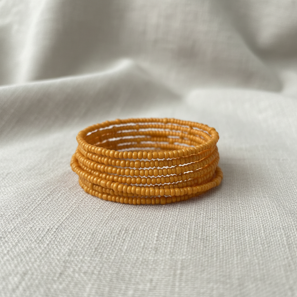 Pulseira laranja/mel organizada em camadas retas